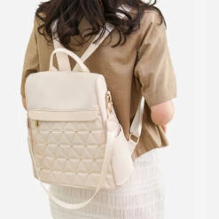 Naha Sac à Dos Antivol Femme élégant -Looqita sac antivol femme Naha beige porte